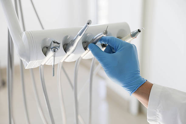 Professional Teeth Whitening technician working in Plandome, NY